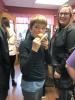 A Moose Madness participant enjoys a caramel apple at Gunflint Mercantile - Photo by RaeAnne Silence